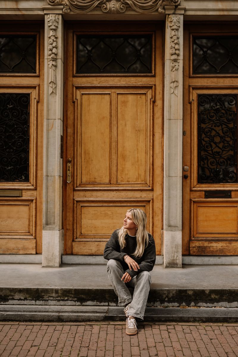 Lisa outside an Amsterdam building
